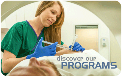 Photo of a Certified Nuclear Medicine Technologist administering a PET tracer