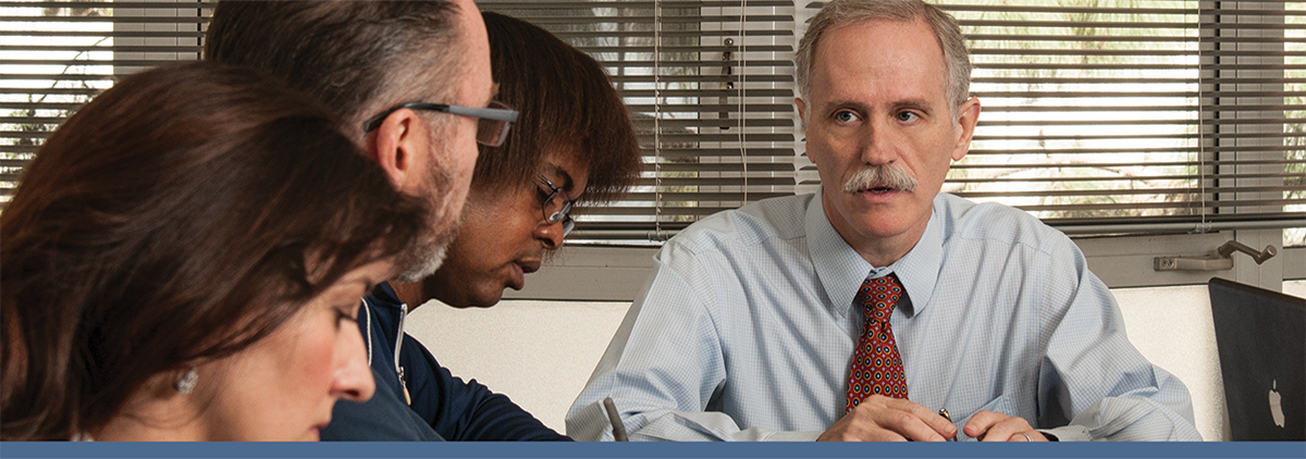 Photo of faculty ans staff meeting