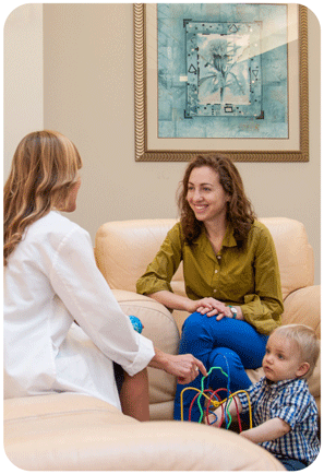 Photo of researchers with a child