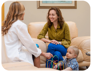 Photo of researchers and child